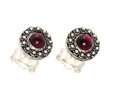 Orecchini d´argento con decorazioni in filigrana sarda e granati