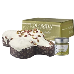Colomba di pasticceria ricoperta di cioccolato bianco e pistacchi con vasetto di crema al pistacchio